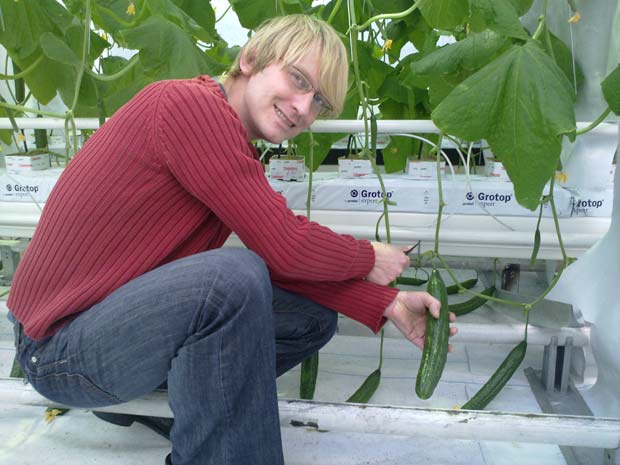 boris inspects the cucumber